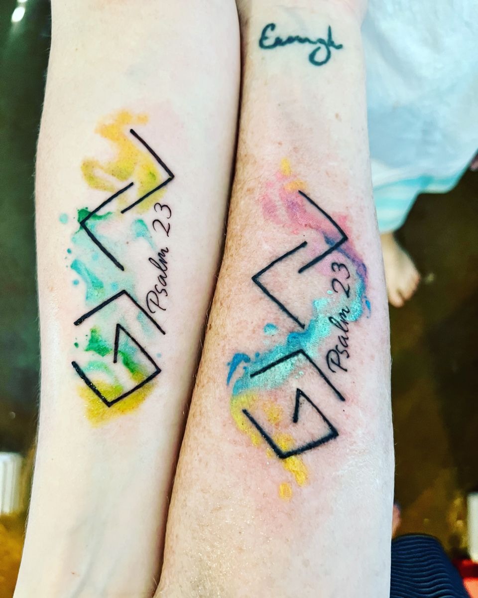 Double-Lined Symbol with Cross Accent Tattoo Design