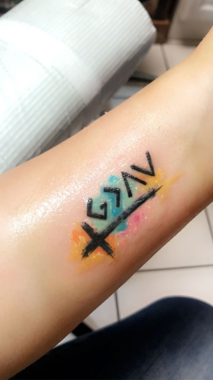 Watercolor Cross and Symbol Tattoo Tattoo Design