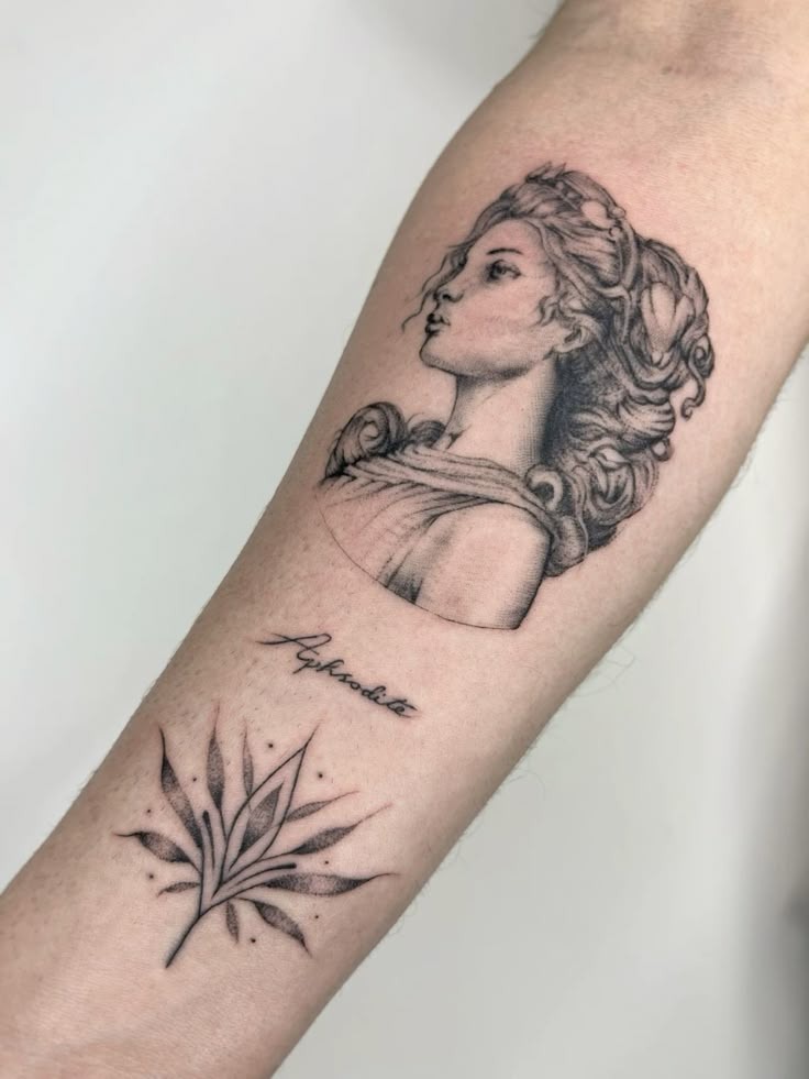 Aphrodite Script Portrait and Leaf Accent Tattoo Design