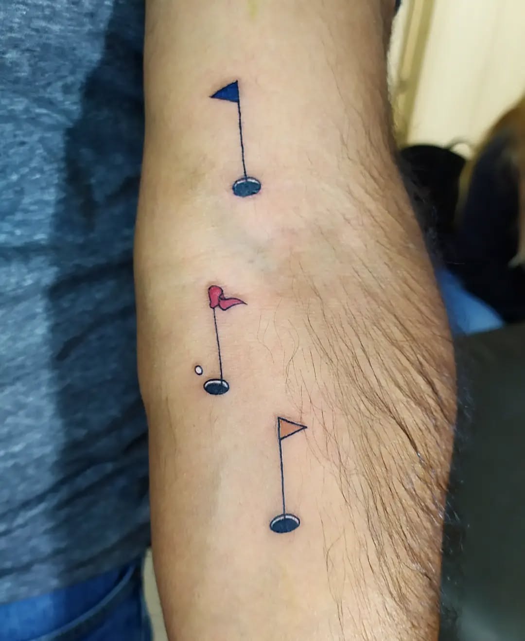 Creative golf-themed musical note tattoos Tattoo Design