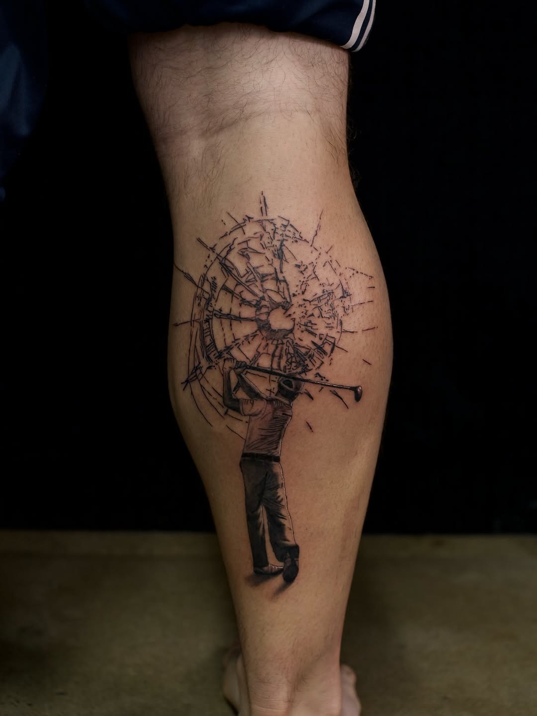 Dynamic golfer tattoo captures swing motion Tattoo Design