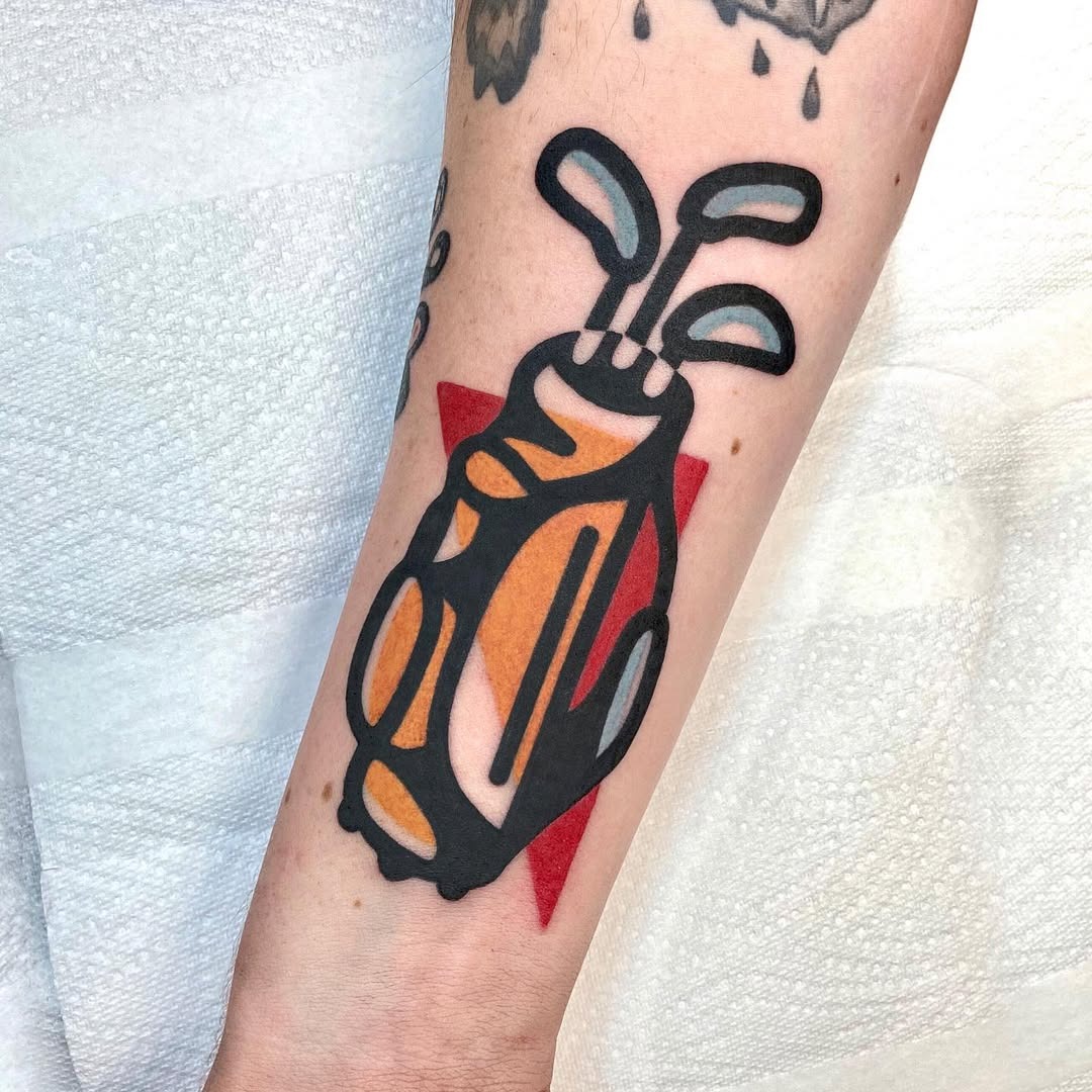Retro golf bag tattoo with vibrant colors Tattoo Design