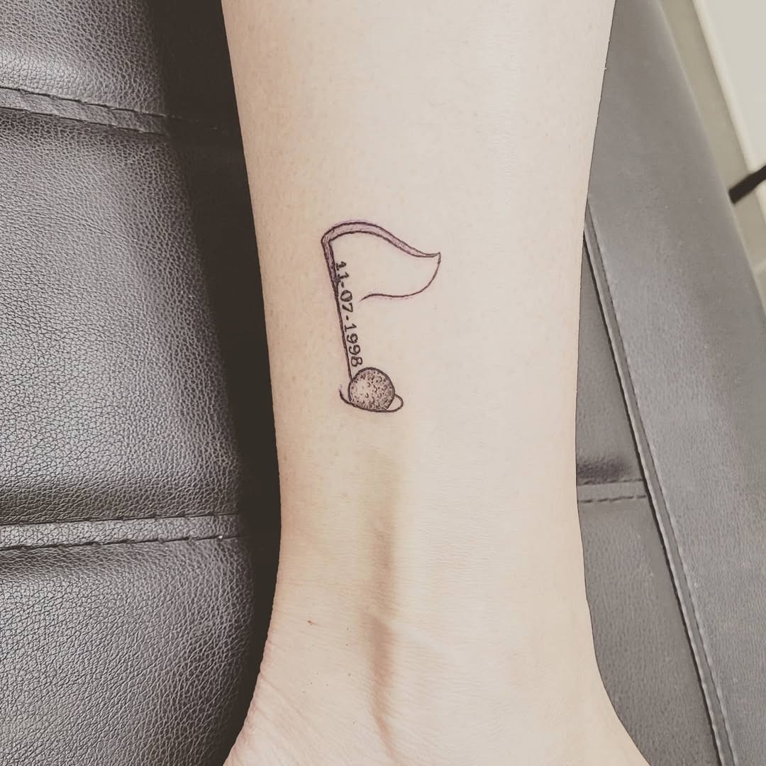 Unique golf flag and ball tattoo design Tattoo Design