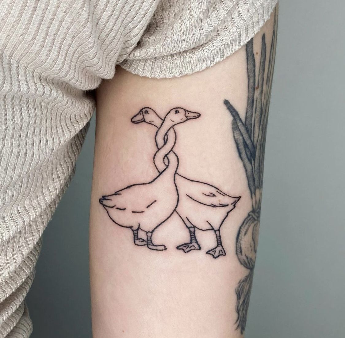 Dainty Twisted-Neck Goose Pair Tattoo Design