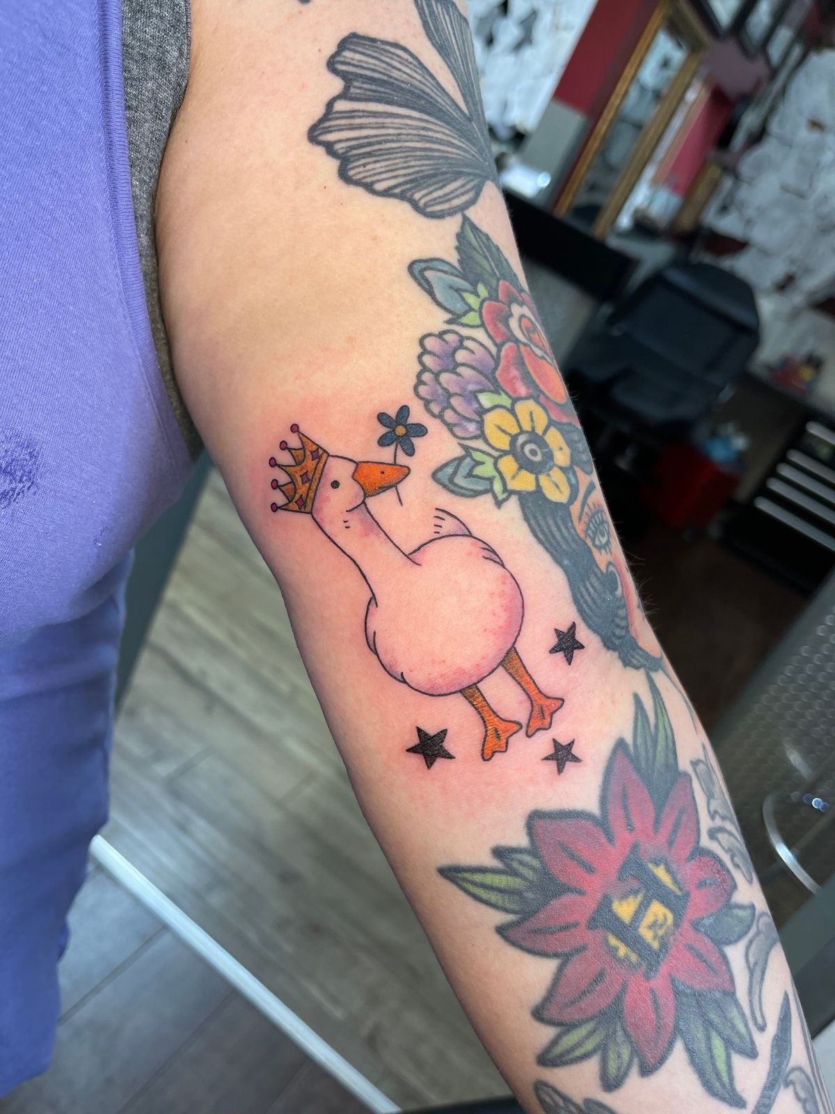 Funny Goose With a Green Saber Tattoo Design