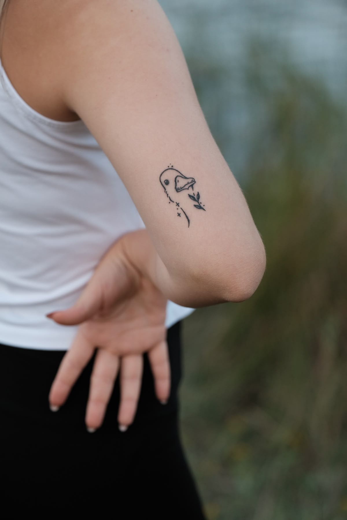 Tiny Cowboy Goose Outline Tattoo Design