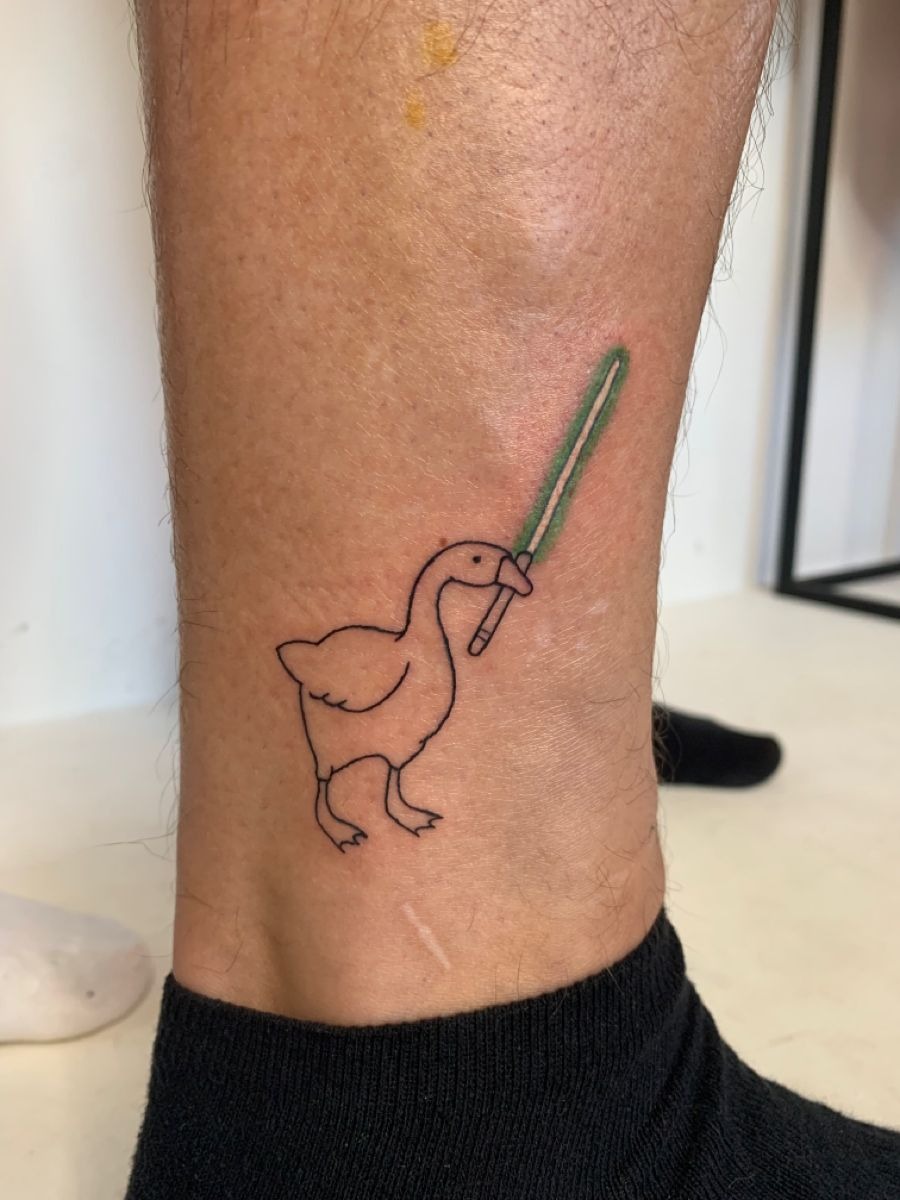 Vintage Goose Portrait in a Flat Cap Tattoo Design