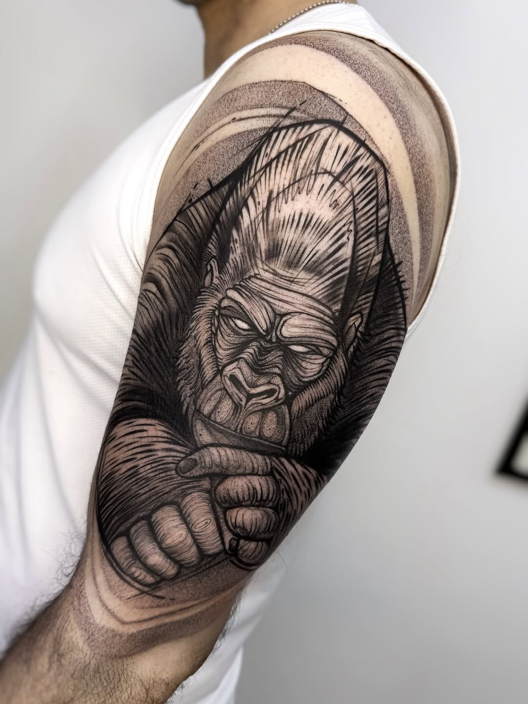 This gorilla tattoo features intricate shading and detail, showing its majestic presence.