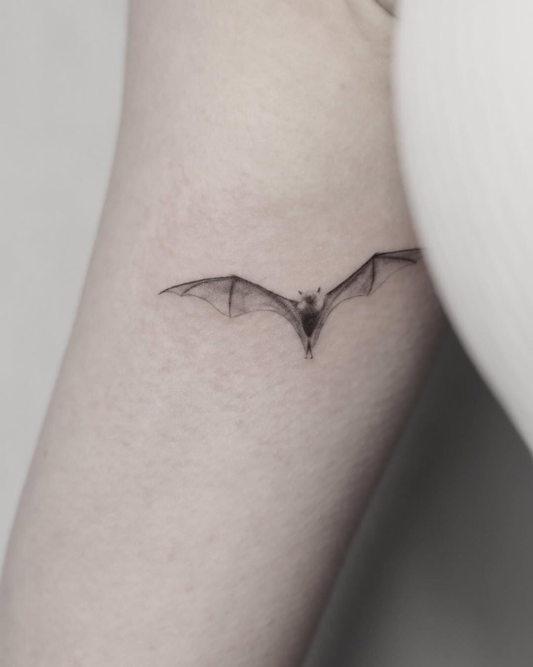Elegant bat tattoo adds dark aesthetic touch Tattoo Design