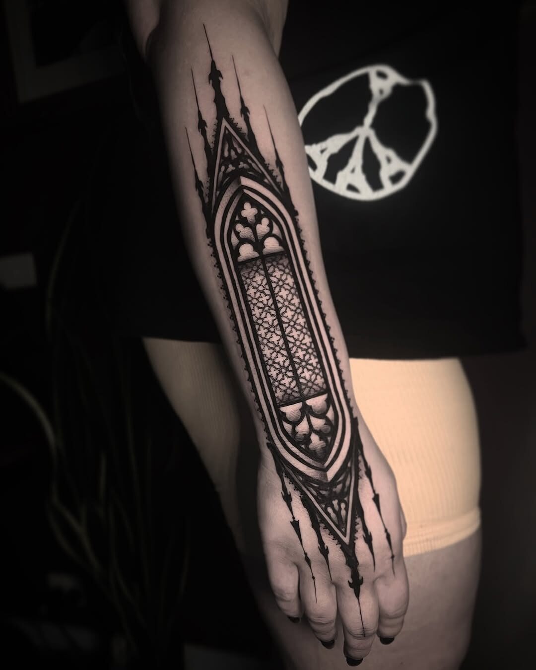 Elegant gothic stained glass forearm tattoo Tattoo Design