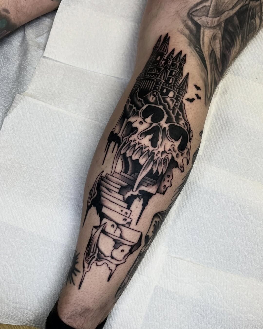 Gothic skull castle tattoo with dark elements Tattoo Design