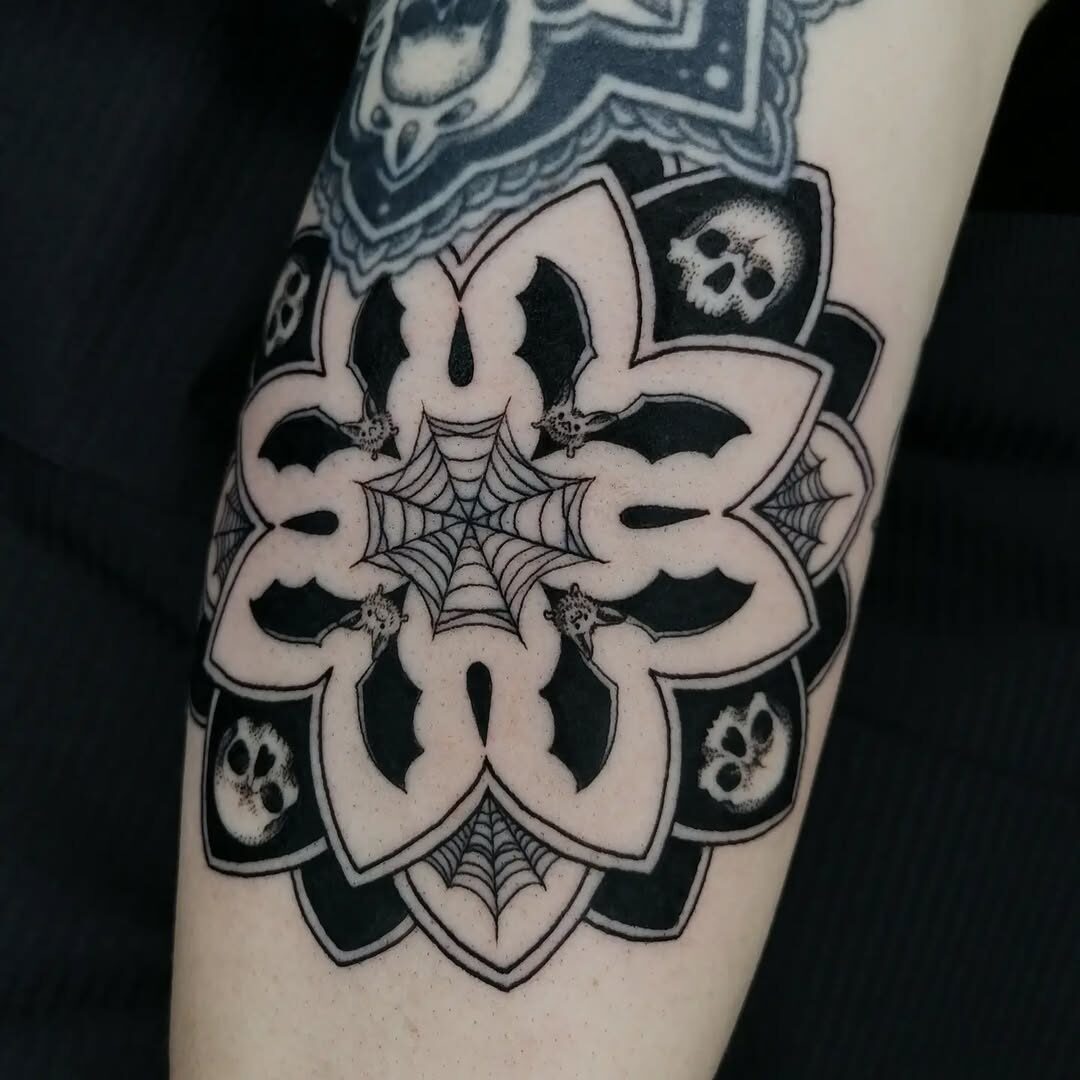 Intricate floral design with gothic elements Tattoo Design