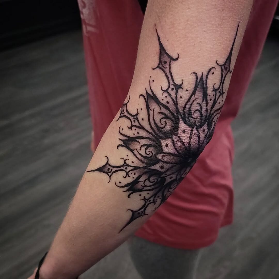 Intricate floral goth tattoo with dark elegance Tattoo Design