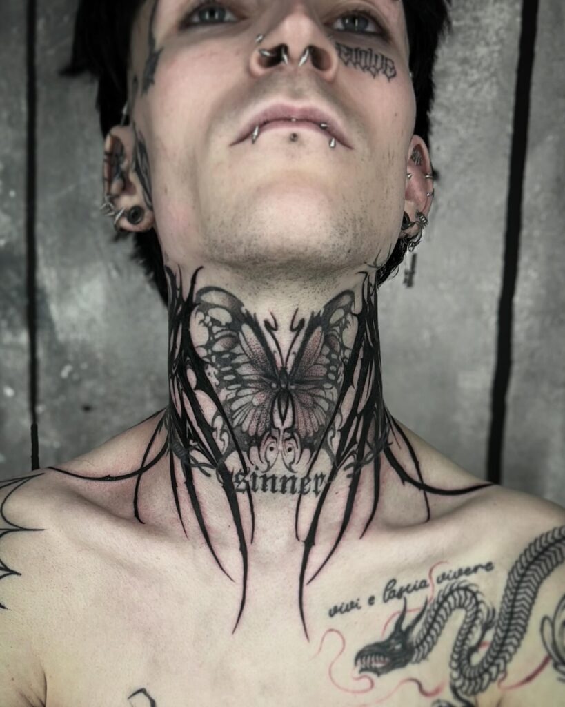 Gothic Butterfly Neck Tattoo with Dark Tribal Elements Tattoo Design