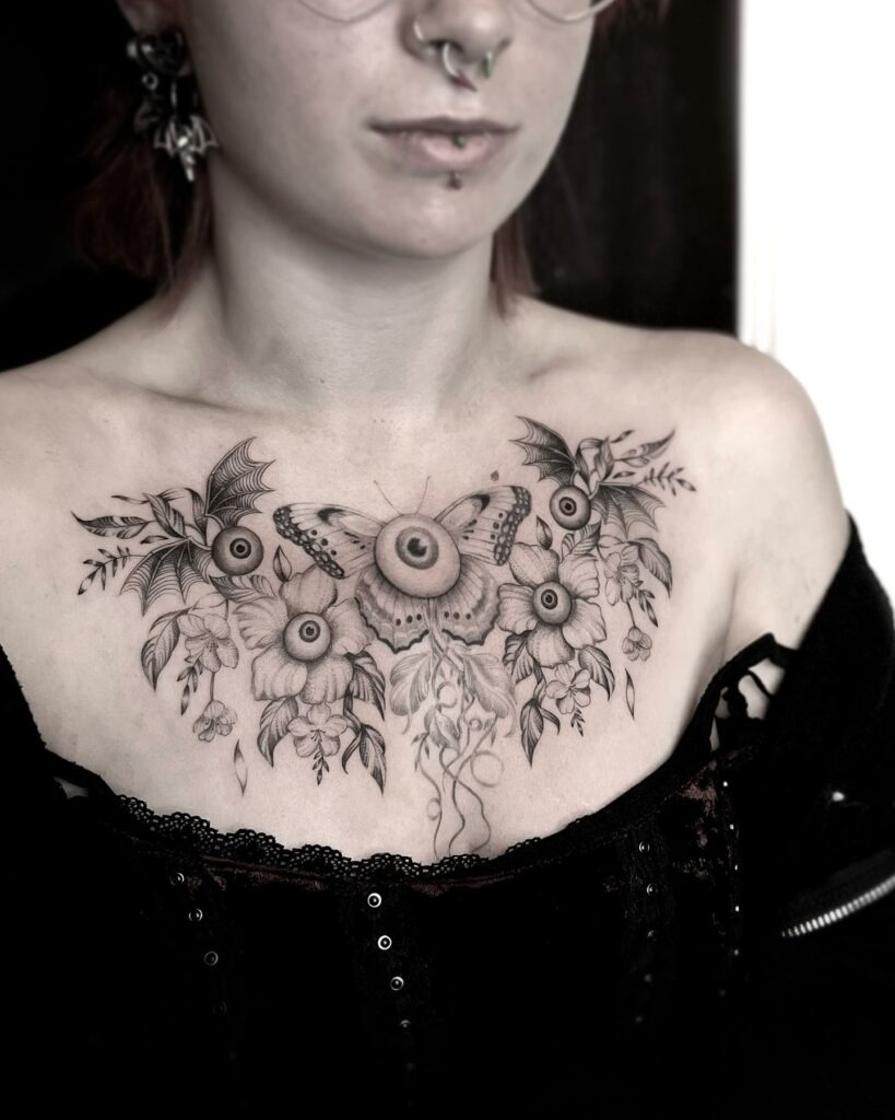Gothic Eyeball Moth and Floral Chest Tattoo Tattoo Design