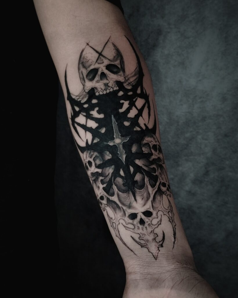 Gothic Skull and Dark Symbol Forearm Tattoo Tattoo Design
