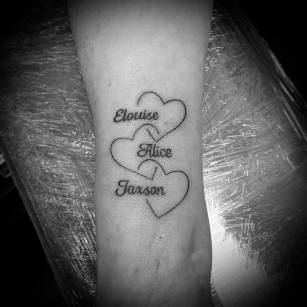Branch Design Forming Infinity Sign with Names Tattoo Design