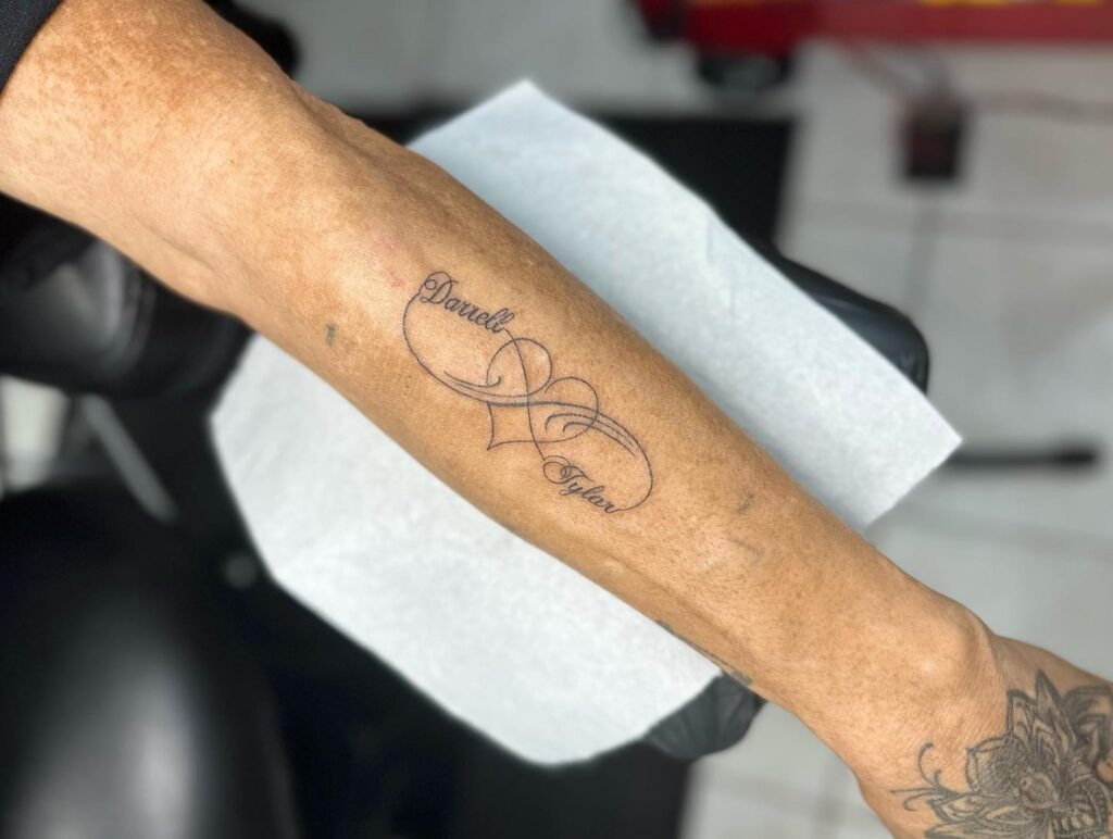Infinity Symbol with Hearts Tattoo Design