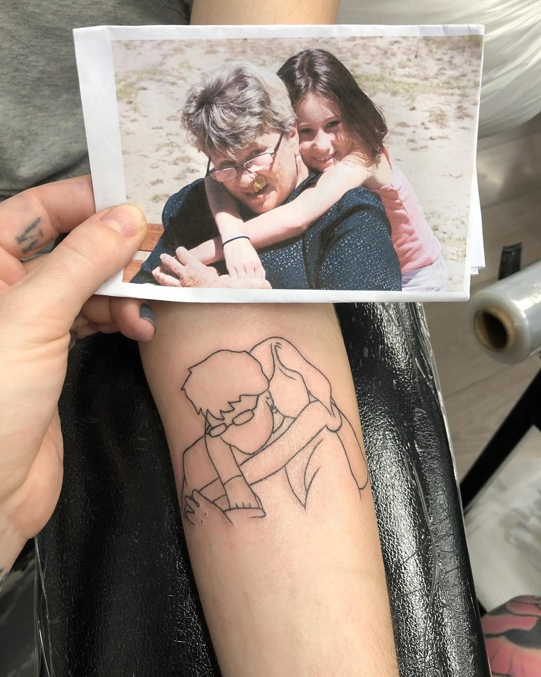 A touching tribute capturing shared moments Tattoo Design