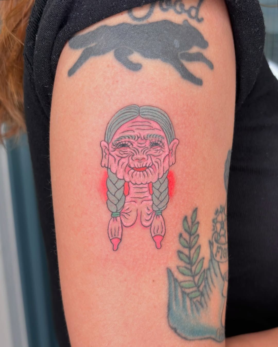 Charming vintage-style grandma tattoo with braids Tattoo Design