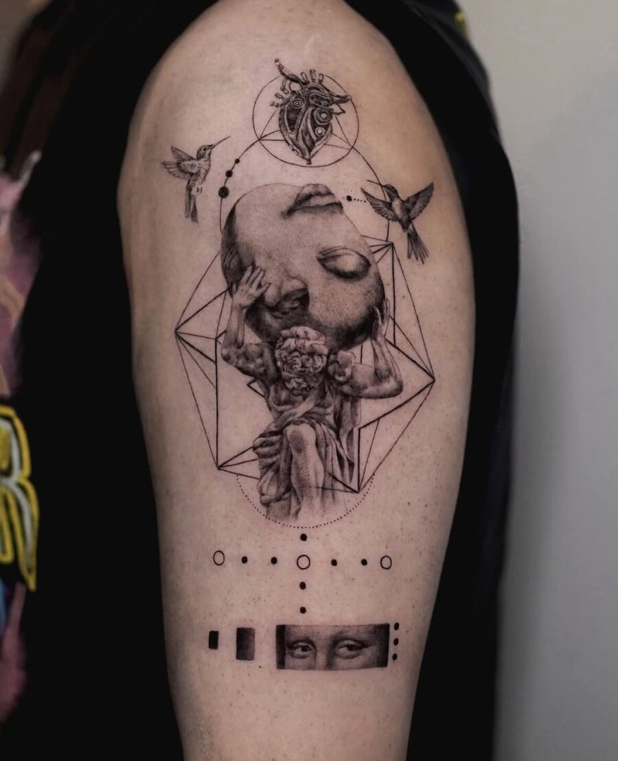 This tattoo showcases a striking depiction of Greek mythology elements, including a poignant figure resting beneath a geometric design.