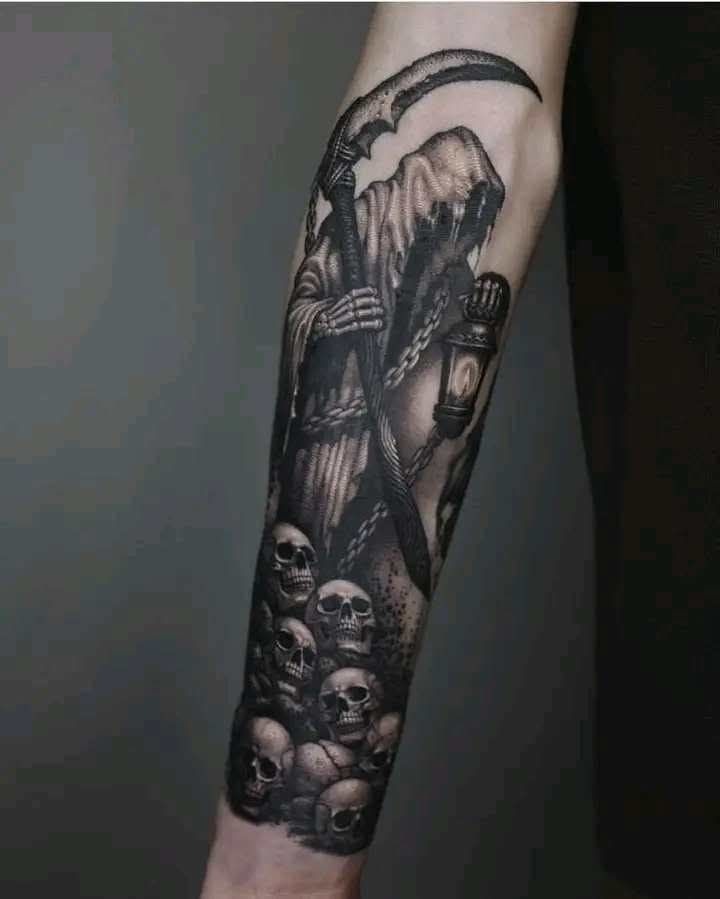Reaper Sleeve With Lantern and Skulls, a tattoo design rendered in bold.