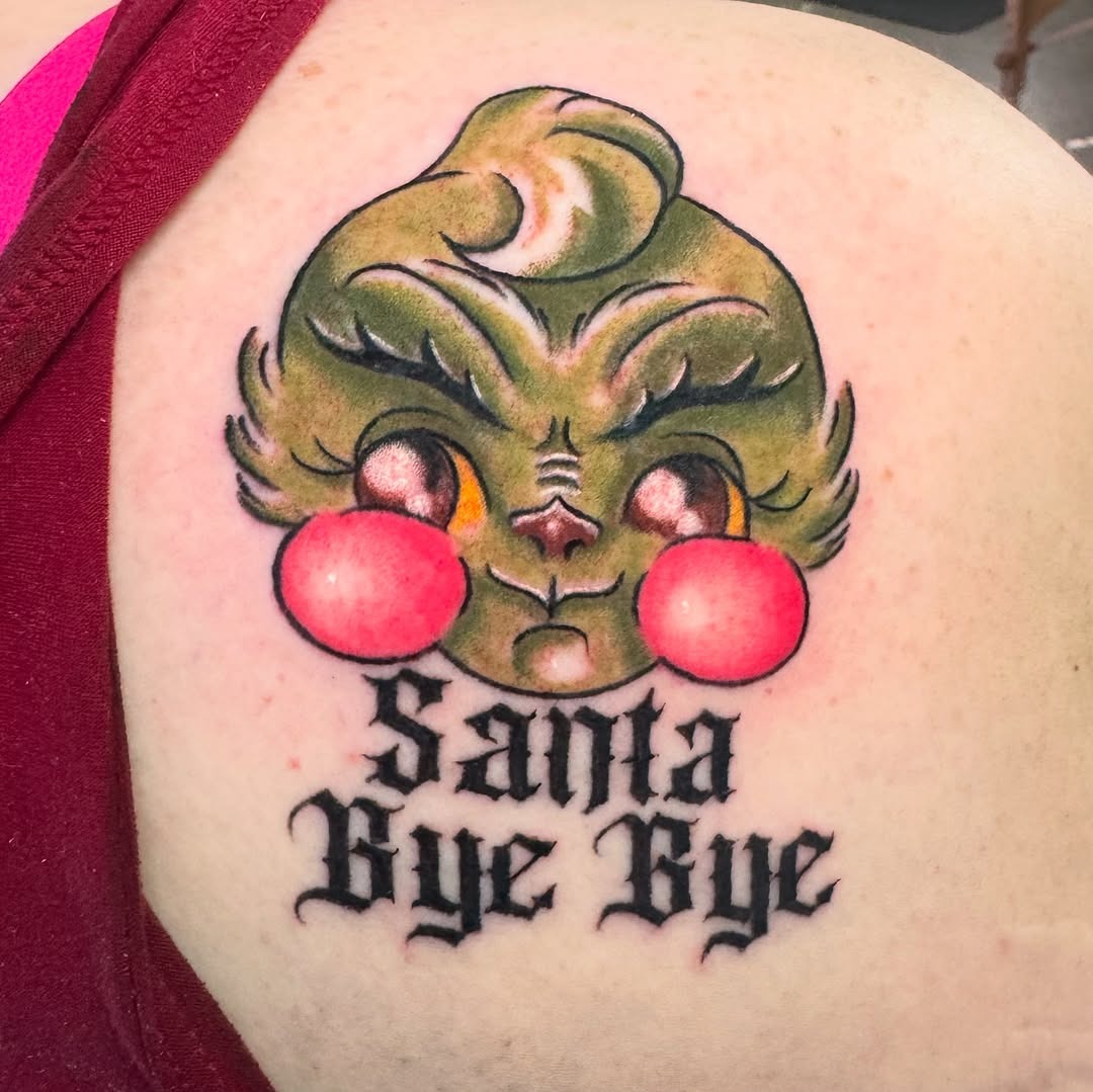 Charming Grinch Tattoo with Playful Vibes Tattoo Design