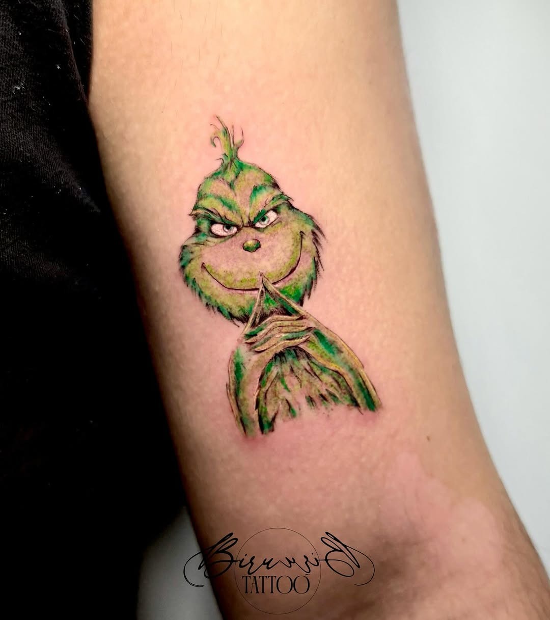 Cheeky Grinch Tattoo for Holiday Spirit Tattoo Design