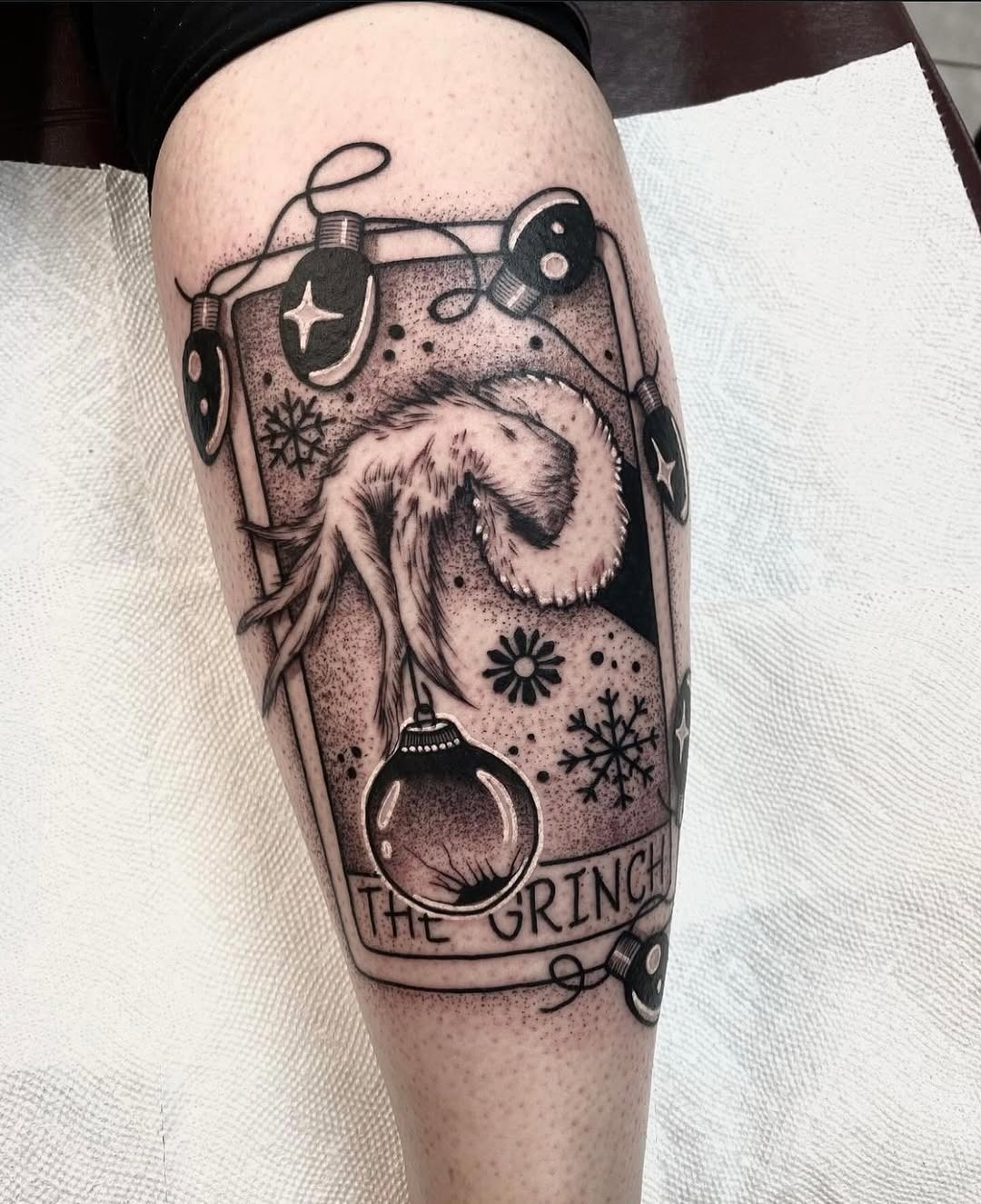 Creative Grinch Tattoo with Festive Ornaments Tattoo Design