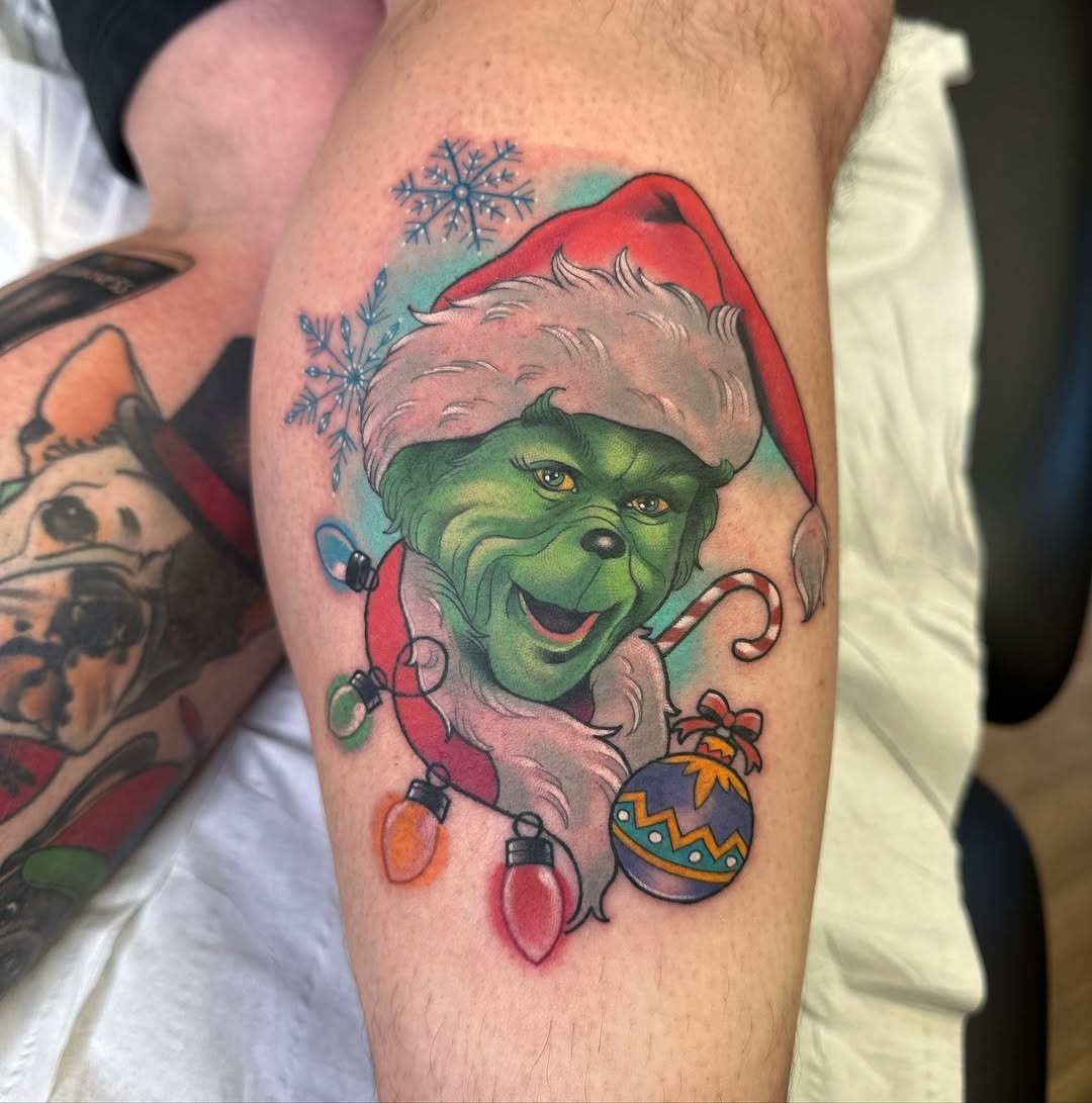 Festive Grinch Tattoo Capturing Holiday Cheer Tattoo Design