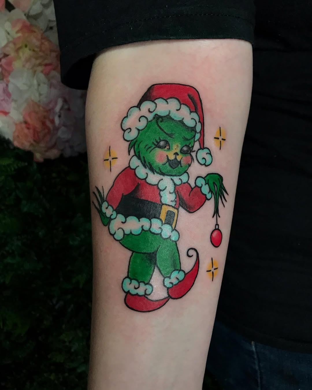 Playful Grinch in Santa Costume Tattoo Tattoo Design