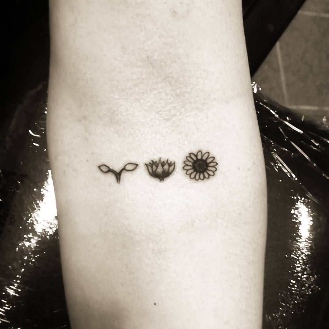 Symbolizing growth through nature’s beauty. Tattoo Design