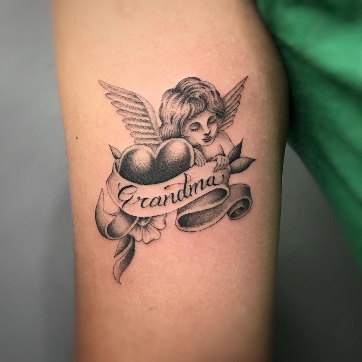 Flowing Blue Line Angel with Monogram Tattoo Design