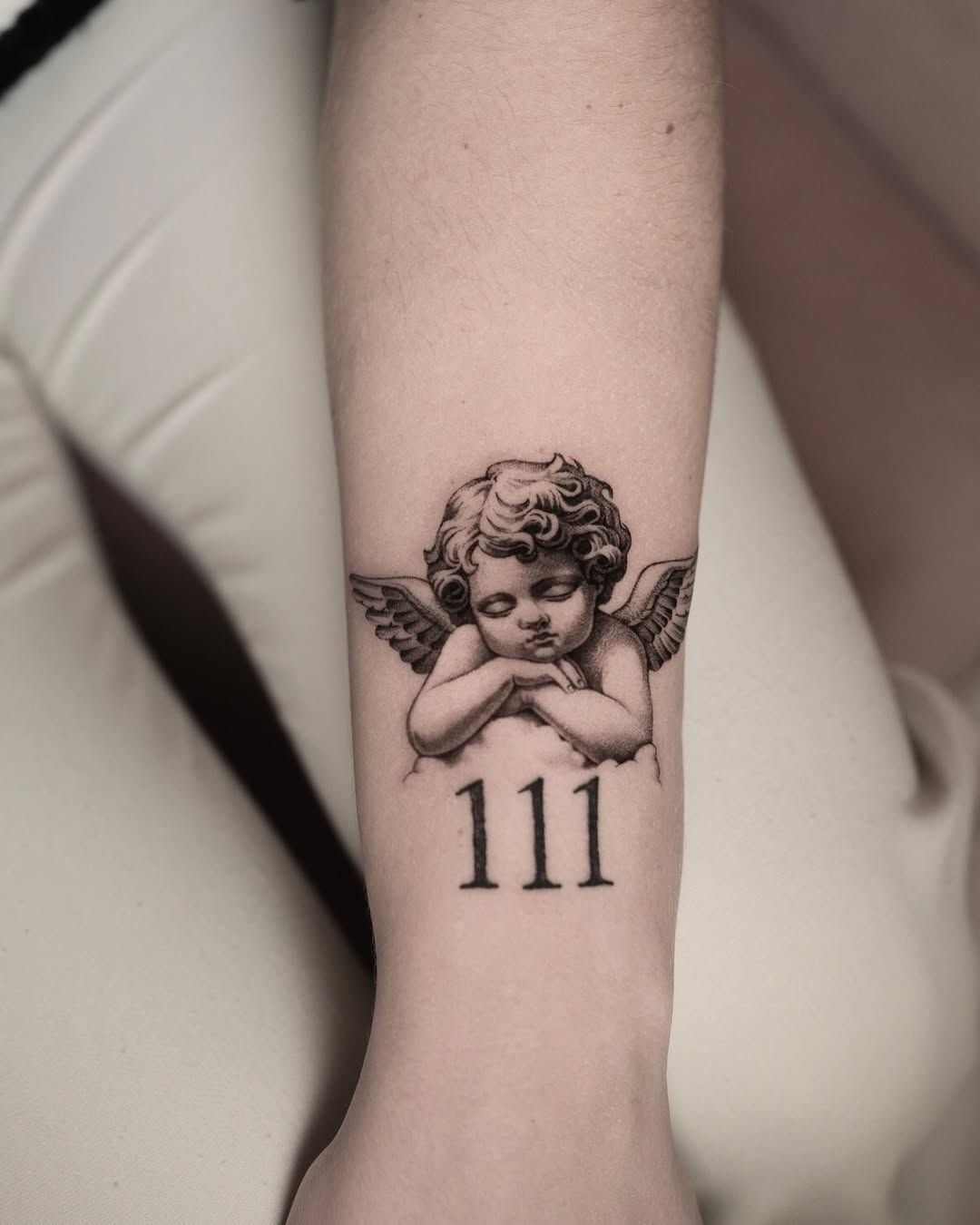 Miniature Archangel in Motion Tattoo Design