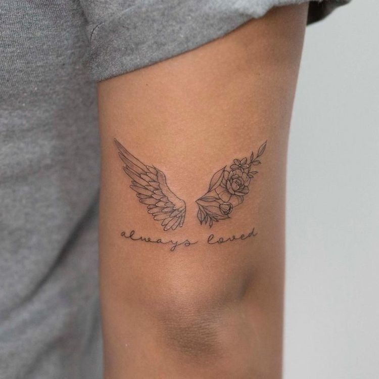 Protective Guardian Angel Holding a Child Tattoo Design