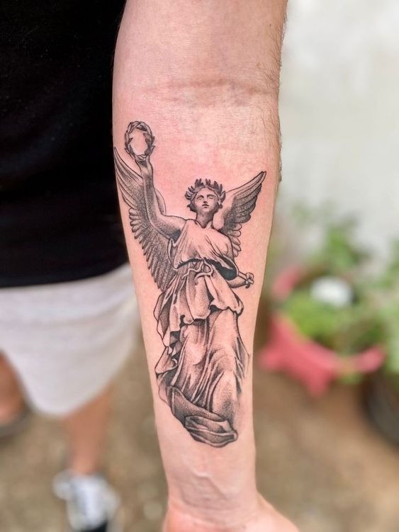 Side-Facing Angel with Feather and Flow Tattoo Design