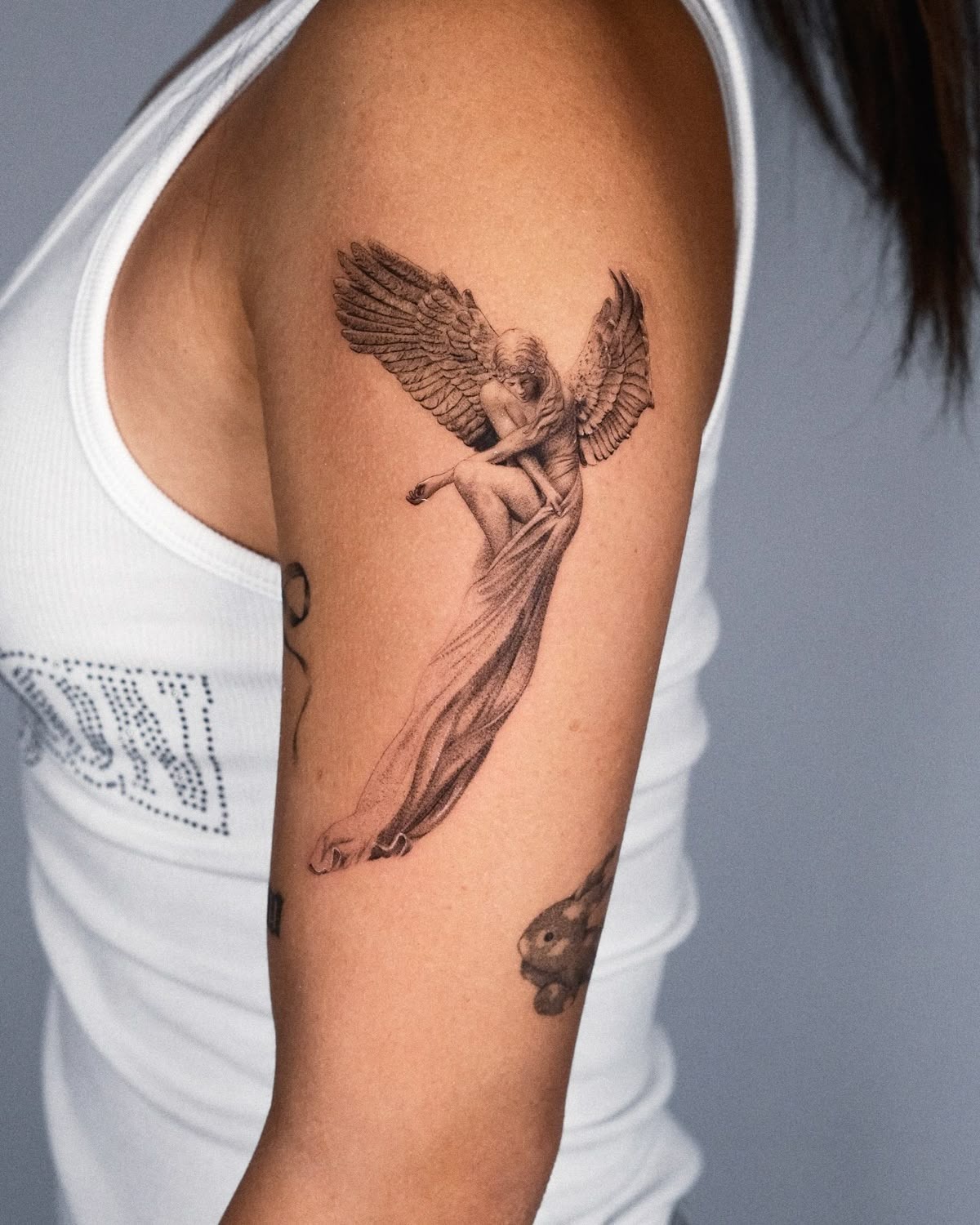 Tiny Wings with Sparkle on the Wrist Tattoo Design