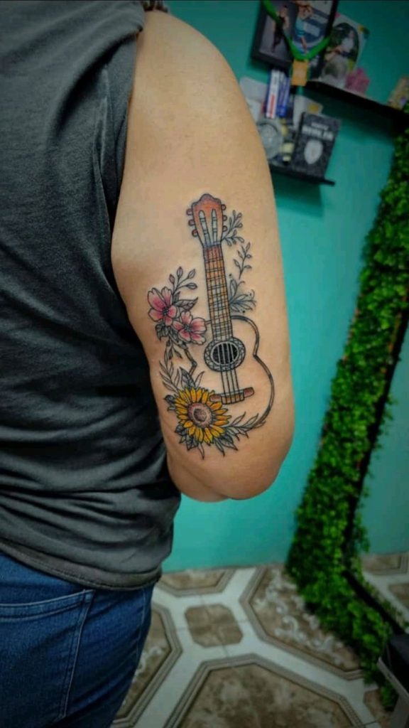 Floral Acoustic Guitar with Sunflower Tattoo Design
