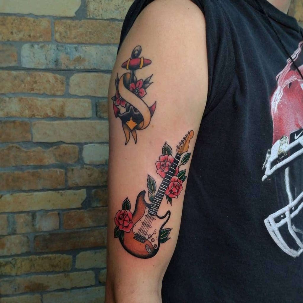 Turquoise Flame Guitar With Pink Blooms Tattoo Design