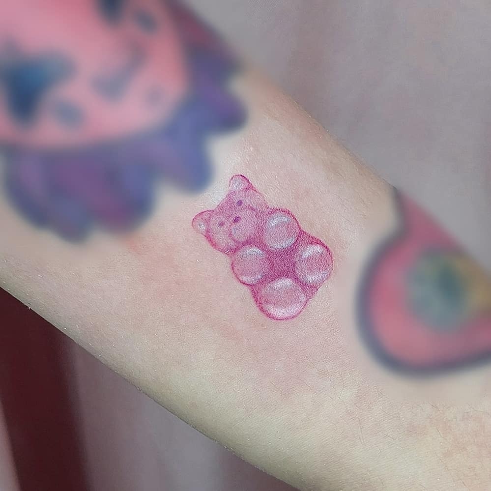 Charming gummy bear tattoo in vibrant pink Tattoo Design