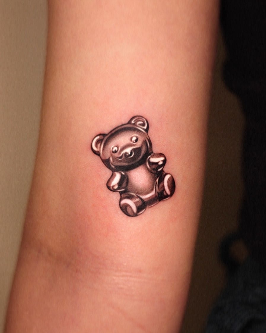 Realistic gummy bear tattoo on forearm Tattoo Design