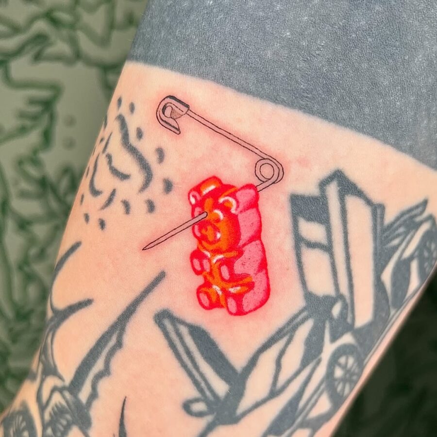 Unique Gummy Bear Tattoo with Safety Pin Tattoo Design