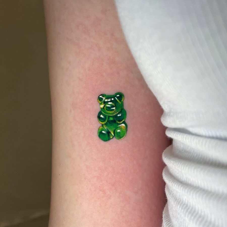Vibrant gummy bear tattoo in green hues Tattoo Design