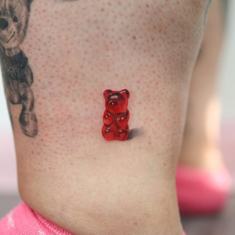 Vibrant gummy bear tattoo on skin Tattoo Design