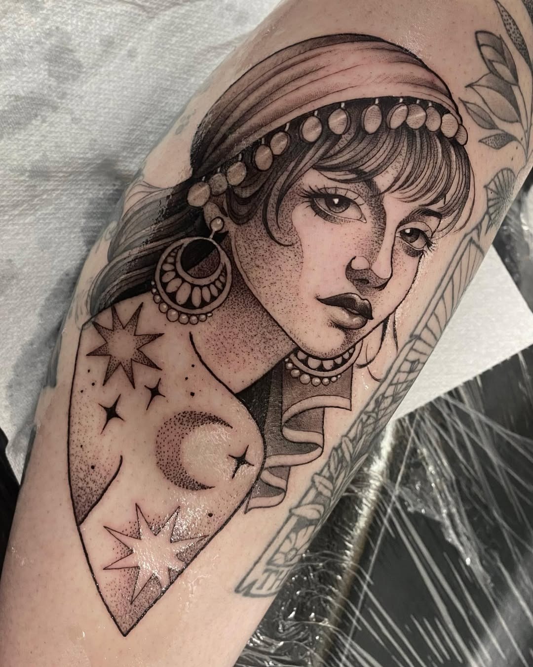 Intricate Gypsy Woman Tattoo with Celestial Elements Tattoo Design