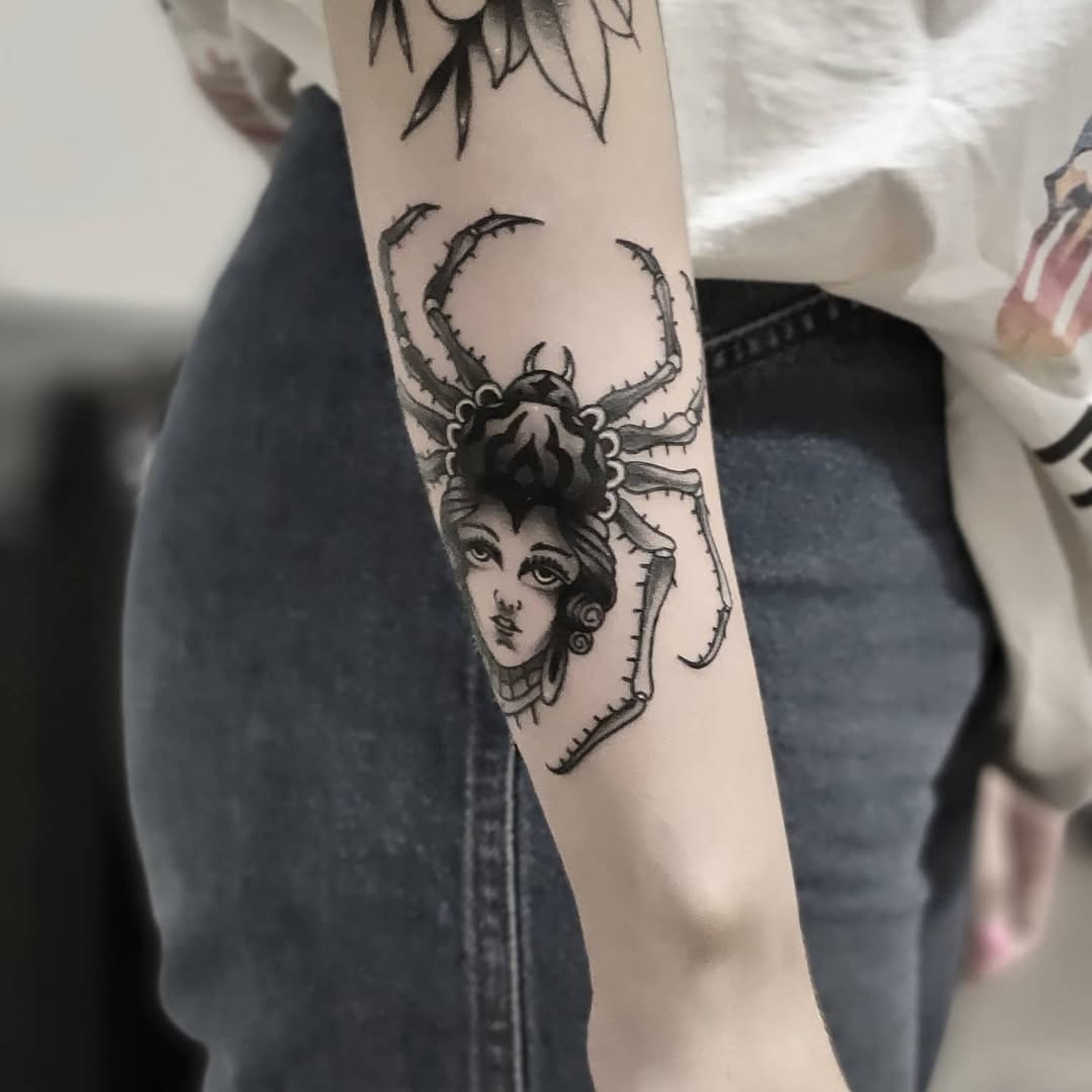 Intricate Spider Woman Tattoo in Black Ink Tattoo Design