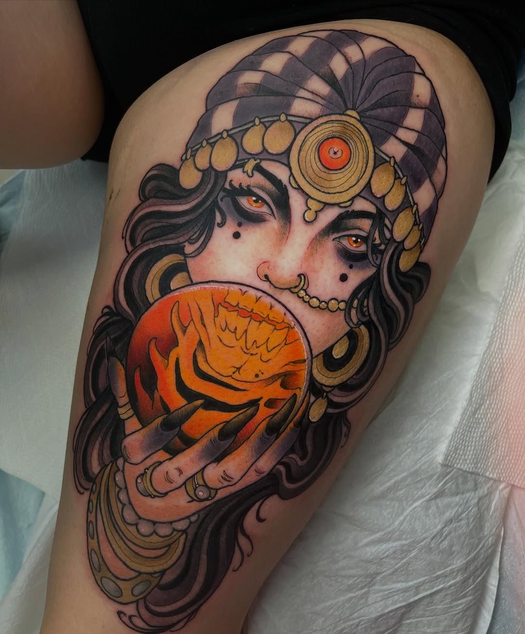 Mystical woman with orange sphere tattoo design Tattoo Design