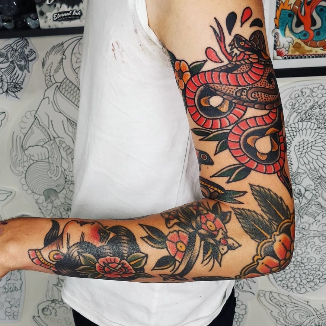 Vibrant Sleeve Tattoo Featuring Snake and Flowers Tattoo Design