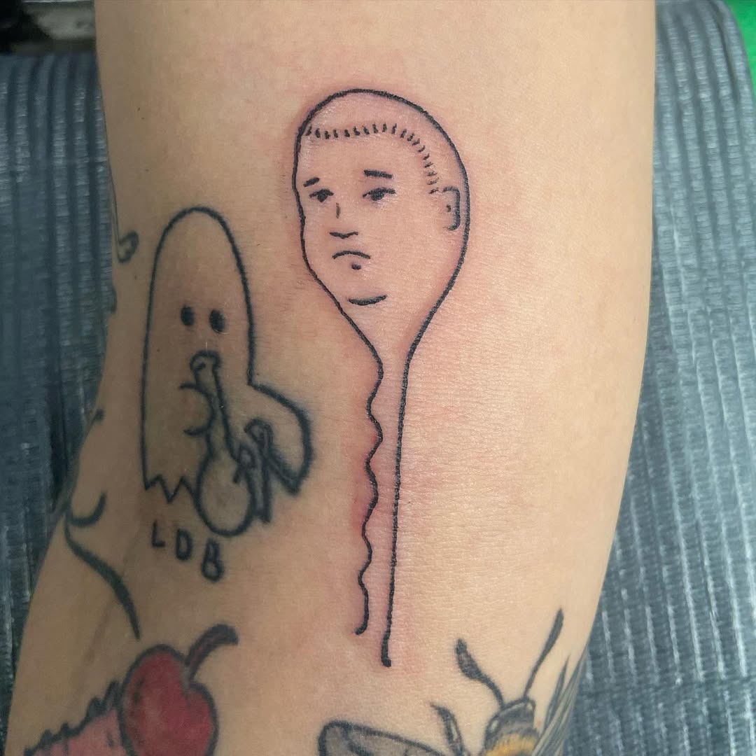Quirky sperm tattoo with a unique expression Tattoo Design