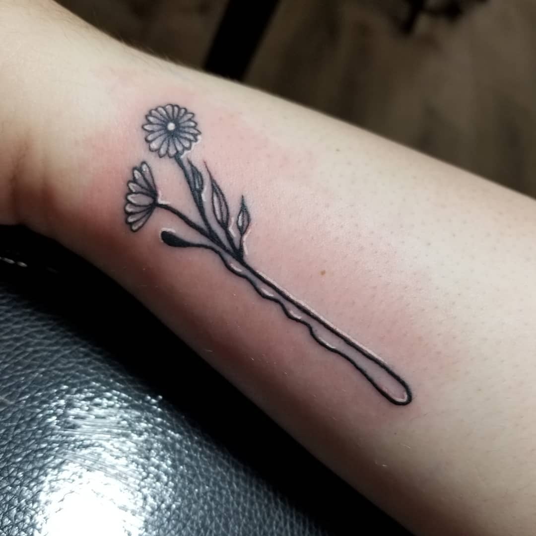 Stylish floral bobby pin tattoo design Tattoo Design